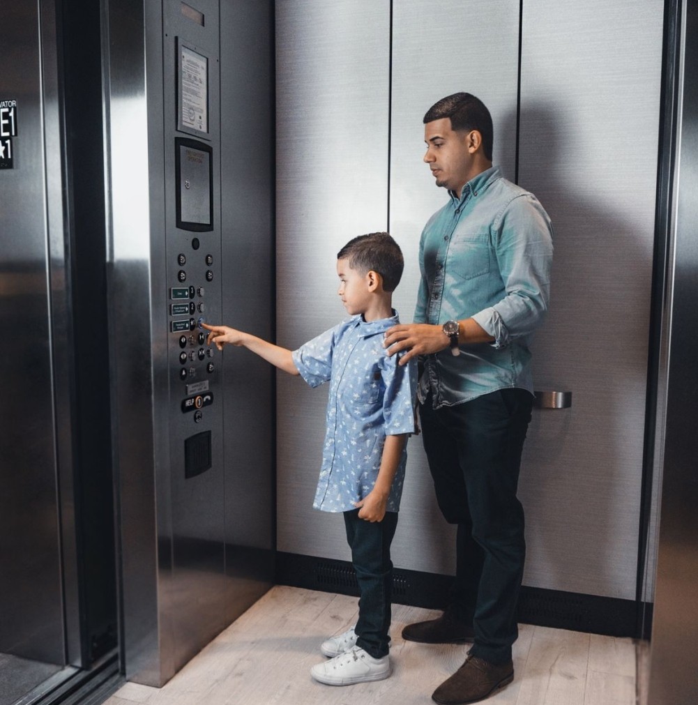 Customers using an elevator installed by Vertical Projects India